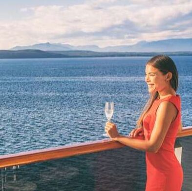 Woman on cruise deck with Champagne